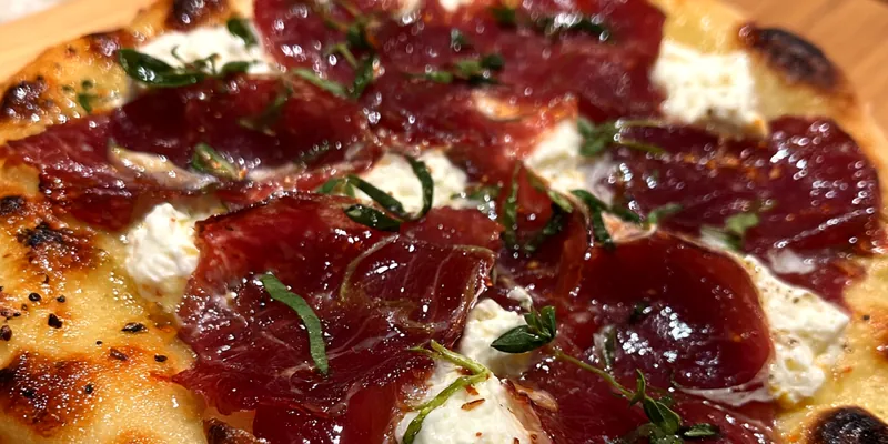 Delicious Gourmet Honey Cheese Pizza served on a plate