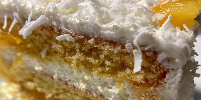 Delicious Pineapple Coconut Dream Cake served on a plate