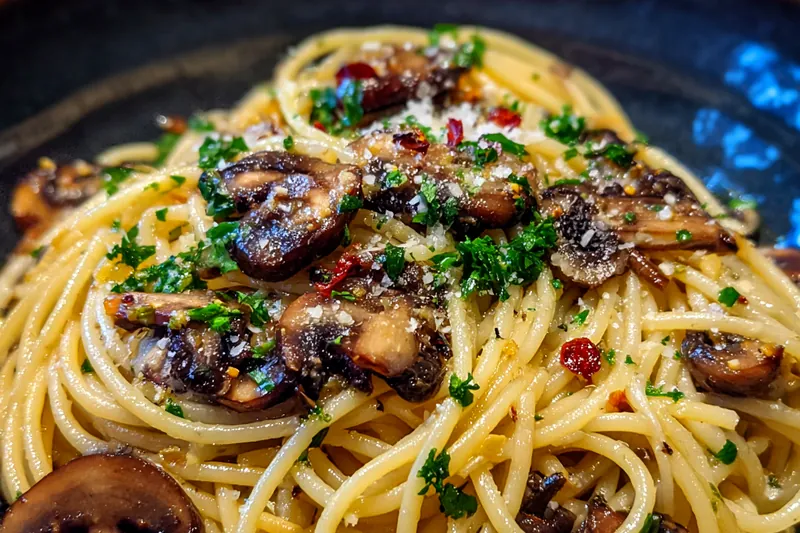 A vibrant display of fresh ingredients for Quick Garlic Mushroom Spaghetti including spaghetti, garlic, and mushrooms.