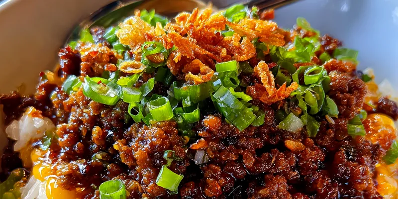 Delicious Savory Garlic Beef Rice Bowl served on a plate